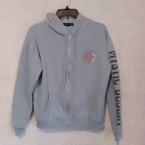 Light Blue Zip-Up Hoodie with Sun Graphic